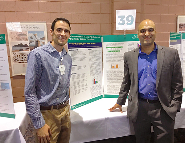 Electrophysiologists displaying clinical research